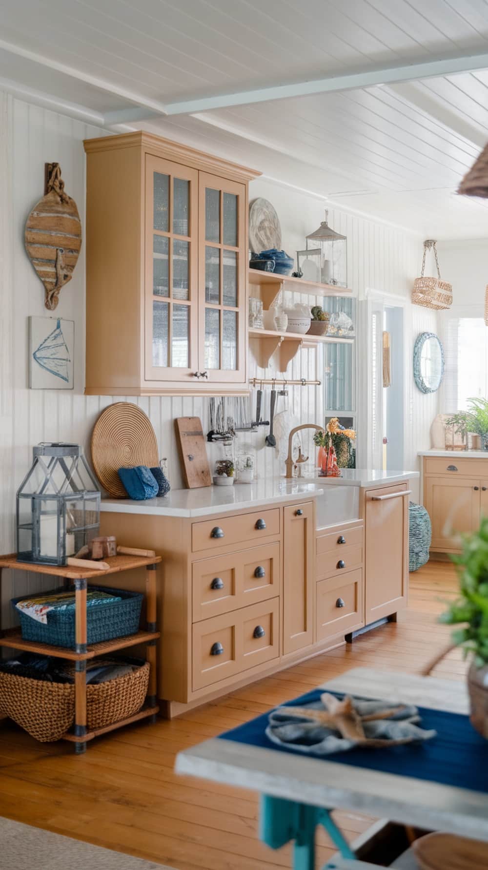 A cozy coastal kitchen featuring caramel cabinets, light wood accents, and beach-themed decor.