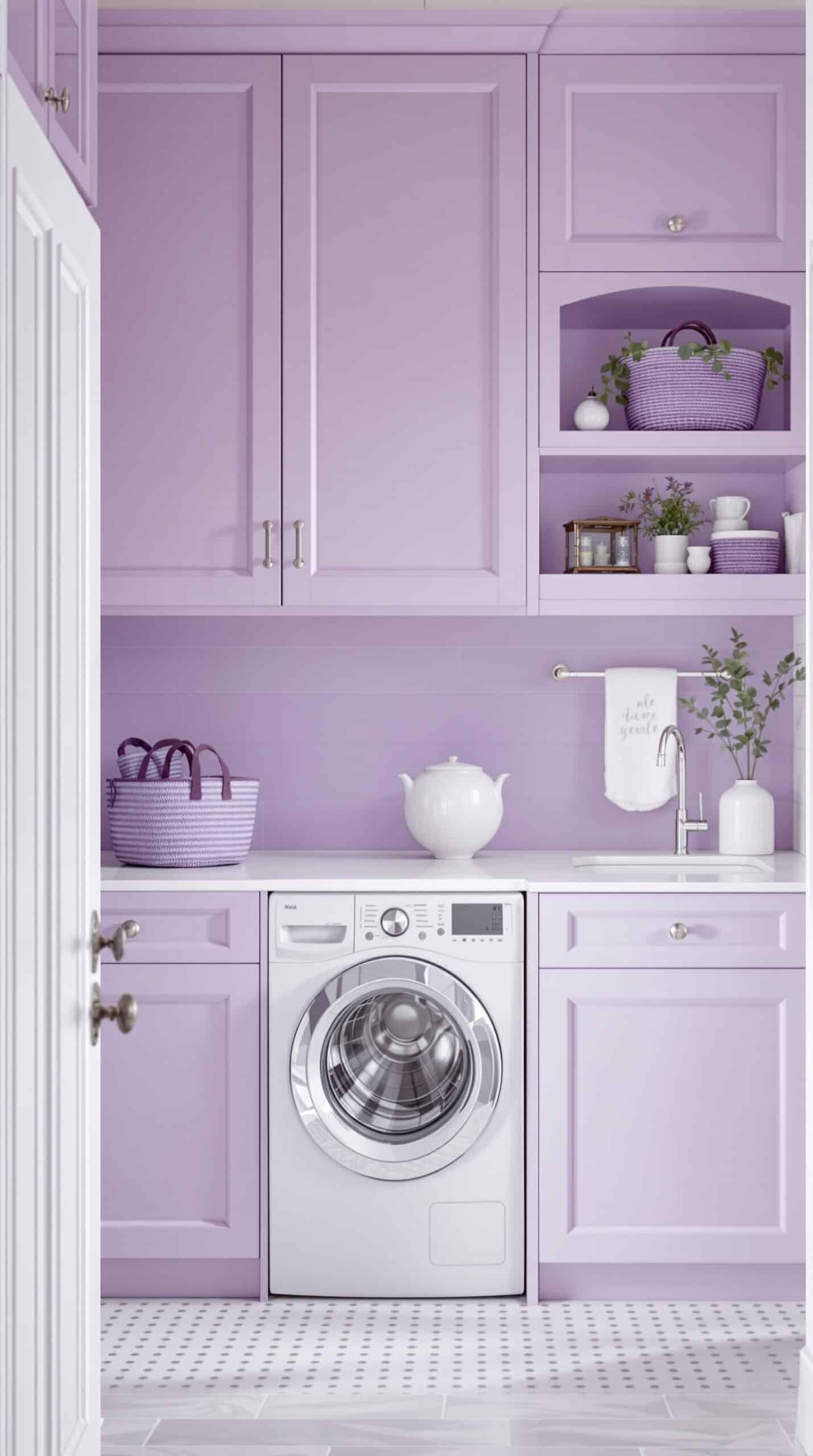 A laundry room featuring lavender cabinets, white countertops, and a washing machine, creating a fresh and inviting atmosphere.