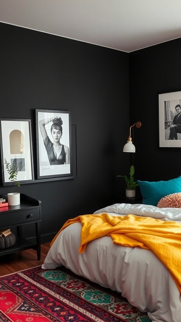 A black bedroom featuring bright accents like a yellow throw blanket and turquoise pillows, with framed artwork on the walls.