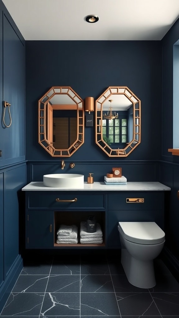 Sleek navy blue bathroom with modern vanity, round sink, gold fixtures, and geometric mirrors.