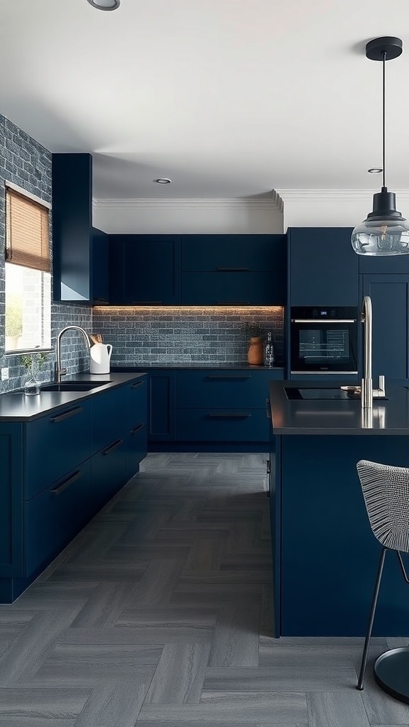 A modern kitchen featuring navy blue cabinets and gray flooring, with subtle lighting.
